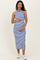 woman wearing a blue and white striped maternity dress with a fitted style and holding her baby bump