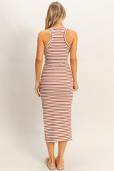 woman wearing a striped midi tank dress with a fitted silhouette and side slits, shown from the back