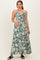 woman wearing a green floral maternity maxi dress with spaghetti straps and a baby bump