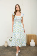 woman wearing a floral print midi dress with ruffled sleeves and a fitted bodice