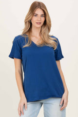 woman wearing a navy blue short sleeve v-neck t-shirt with relaxed fit and casual style
