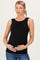 woman wearing a black ribbed maternity tank top and holding her baby bump