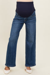 woman wearing blue maternity jeans with a stretchy over-the-bump panel and wide-leg fit