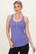 woman wearing a purple ribbed tank top with button details and a fitted silhouette