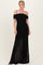 woman wearing a black off-shoulder evening gown with ruched detailing and sheer bottom panel