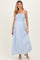 woman wearing a light blue maternity maxi dress with a smocked bodice and adjustable straps, and showing a baby bump