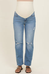 maternity wear light blue distressed jeans with a high waistband, model showing a baby bump