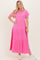 woman wearing a bright pink button-up maxi dress with short sleeves and a tiered design