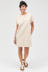 woman wearing a short sleeve cream and beige striped casual dress with a pocket and relaxed fit