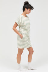 woman wearing a striped short sleeve dress with pockets in a relaxed fit and knee-length style