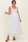 woman wearing a white lace maxi maternity dress with adjustable straps and a visible baby bump
