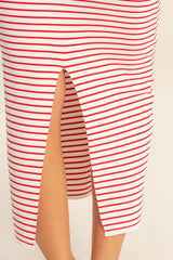 white and red striped midi skirt with a side slit detail