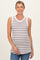 woman wearing a striped maternity tank top in brown and white with a relaxed fit