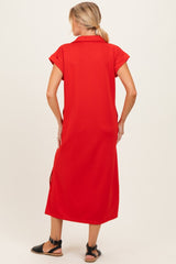 woman wearing a red maternity dress with short sleeves and a side slit, view from the back