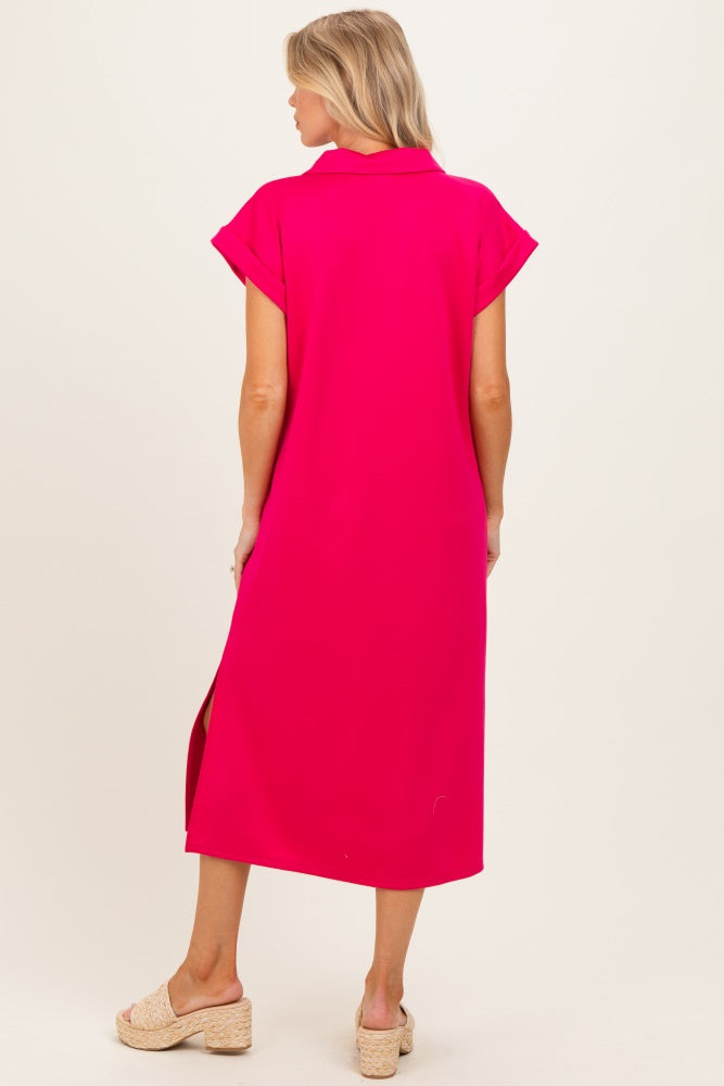 woman wearing a bright pink maternity dress with short sleeves and side slits, viewed from the back