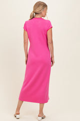 woman wearing a hot pink cap sleeve maxi dress, viewed from the back