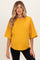 woman wearing a mustard yellow maternity top with a relaxed fit and short sleeves