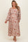 woman wearing a floral long sleeve maternity plus dress with a tied waist and visible baby bump