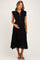 woman wearing a black maternity dress with ruffled sleeves and a button-down front, cradling her baby bump