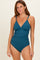 woman wearing a teal maternity swimsuit with a ribbed texture and decorative shoulder straps