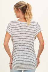woman wearing a light striped maternity top with short sleeves and a fitted style, view from the back