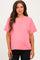 woman wearing a pink maternity t-shirt with short sleeves and a relaxed fit, showcasing her baby bump