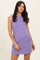 woman wearing a sleeveless lavender casual dress with a relaxed fit and side pockets