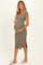 woman wearing a olive green fitted maternity dress with short sleeves and a side split, showing her baby bump