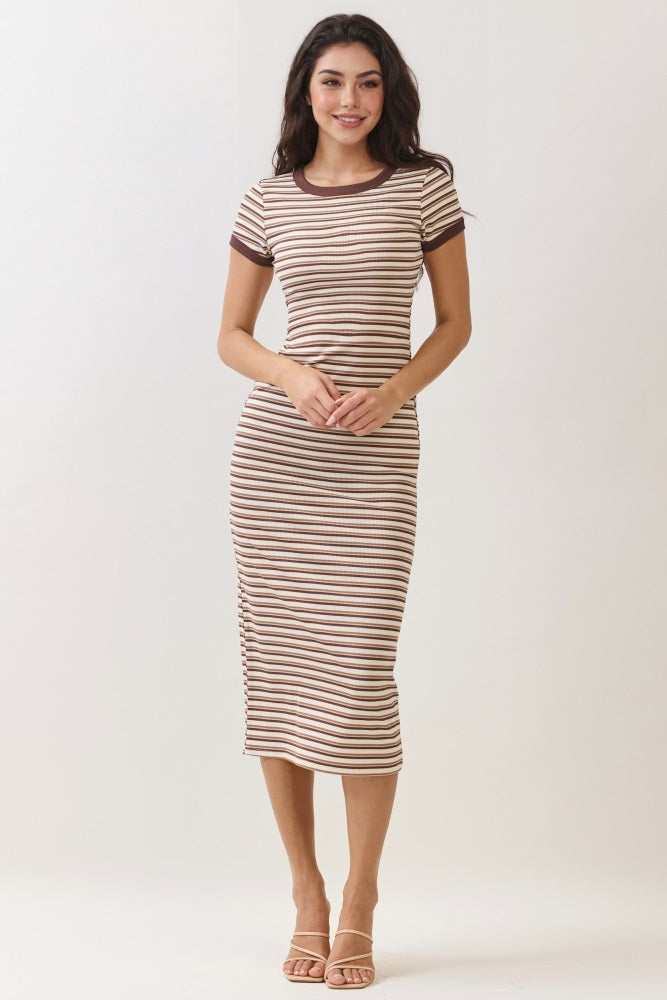 woman wearing a cream and brown striped midi dress with short sleeves and a fitted silhouette