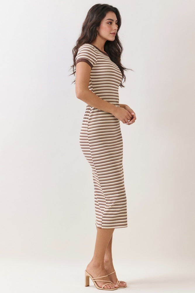 woman wearing a brown and cream striped midi dress with short sleeves and a fitted silhouette