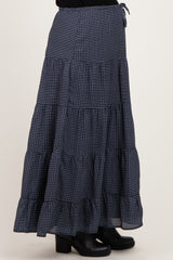 maternity wear navy blue gingham tiered maxi skirt with adjustable tie detail worn by a model