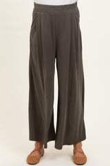 woman wearing gray wide-leg maternity pants with a relaxed fit and elastic waistband