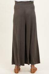 maternity wear long dark gray wide-leg pants showing the back view with an elastic waistband