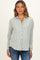 woman wearing a light green and white striped maternity shirt with button details and long sleeves