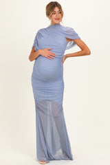 woman wearing a lavender maternity gown with ruched detailing and one shoulder design, highlighting her baby bump