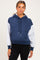 woman wearing a navy and gray color block maternity hoodie with a front pocket and hood