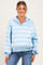 woman wearing a light blue striped maternity pullover with a collared neckline and relaxed fit, showcasing her baby bump