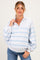 woman wearing a light gray and blue striped maternity pullover sweatshirt with a collar and button detail