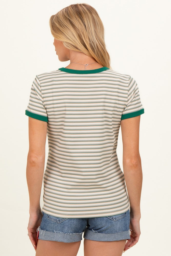 woman wearing a striped maternity t-shirt with green accents and denim shorts, showing the back view