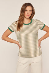 woman wearing a striped short sleeve t-shirt with green trim and a relaxed fit