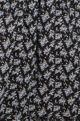 black floral maternity dress with small blue and white flowers