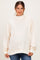 woman wearing a cream floral print maternity sweatshirt with a high collar and relaxed fit