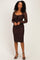 woman wearing a brown lace long sleeve dress with a fitted silhouette and a scoop neckline