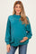 woman wearing a teal maternity sweatshirt with a relaxed fit, holding her baby bump