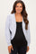 woman wearing a light gray maternity cardigan over a black top, showing her baby bump