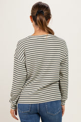 woman wearing a striped long sleeve maternity top, shown from the back with a relaxed fit and casual style
