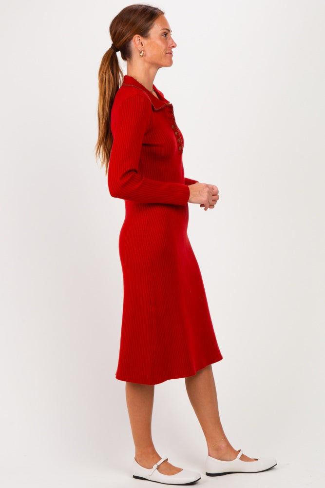 woman wearing a red ribbed long sleeve midi dress with buttons and white flats