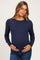 woman wearing a navy blue long sleeve maternity sweater and holding her baby bump