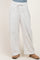 woman wearing white wide leg lounge pants with drawstring and pockets