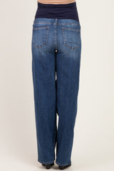 woman wearing dark blue maternity jeans with a stretchy waistband, seen from the back